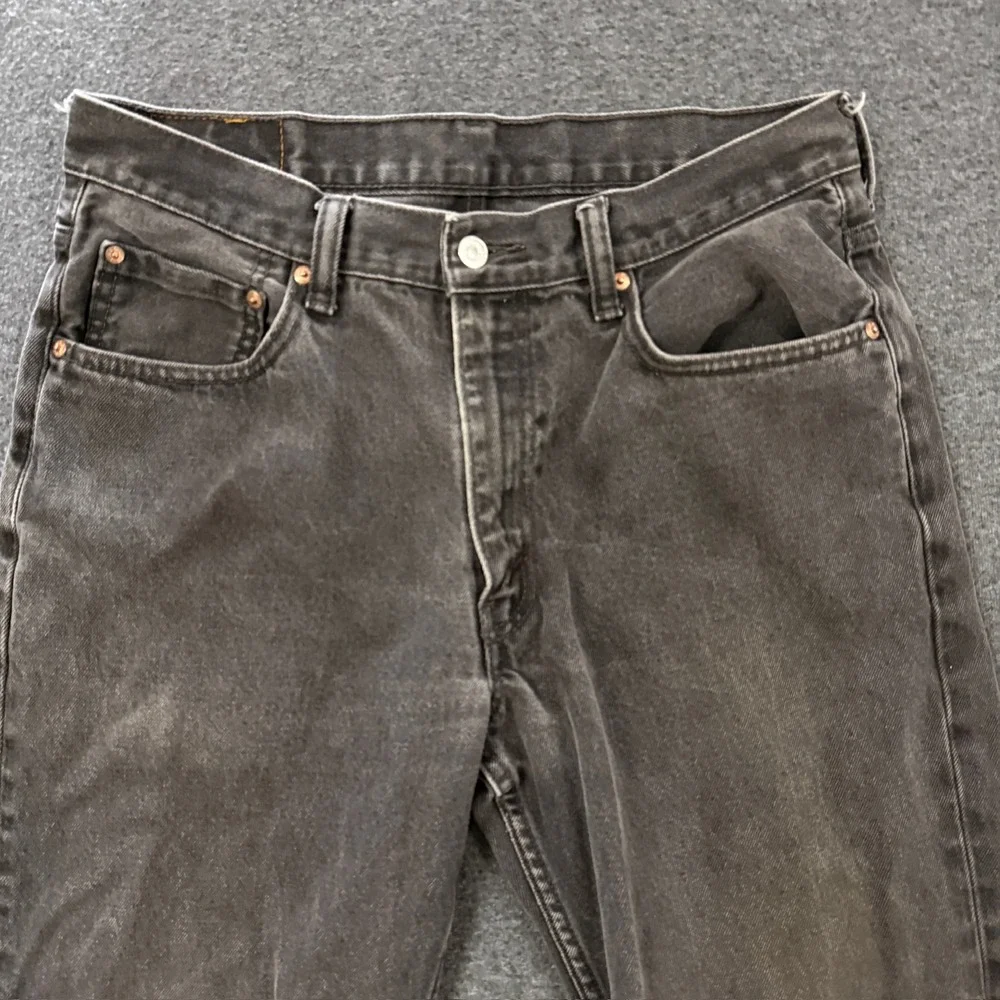 Vintage Levis 550 Relaxed Fit Jeans Mens 34x29 Black Good Raw Hem Cutoff Capri